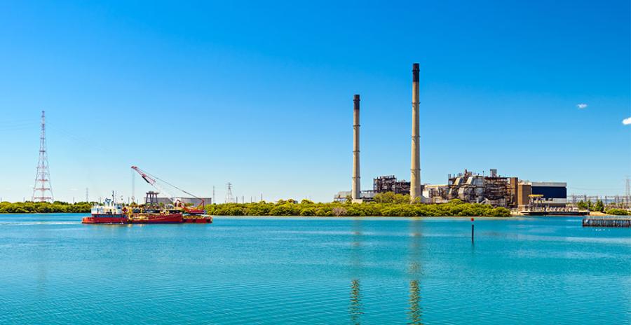 View across water to coal-fired power station