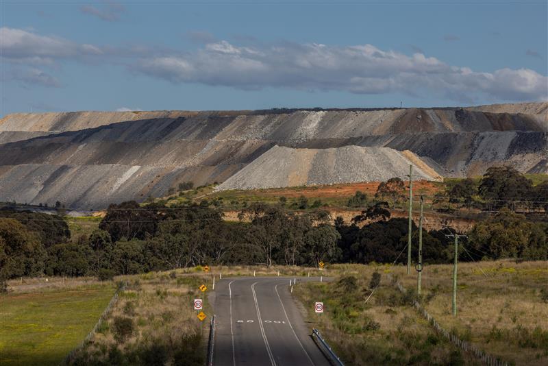 Panoramic shot of road leading to a coal mine