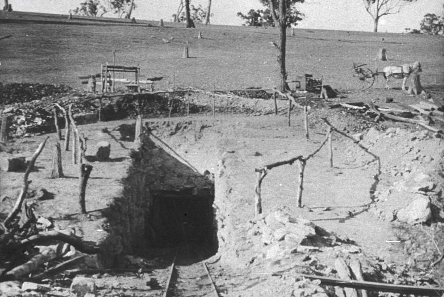 Black and white image of a coal mine
