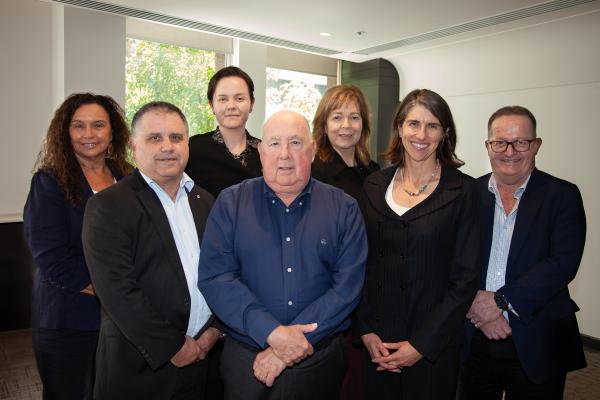 A group of business people standing together
