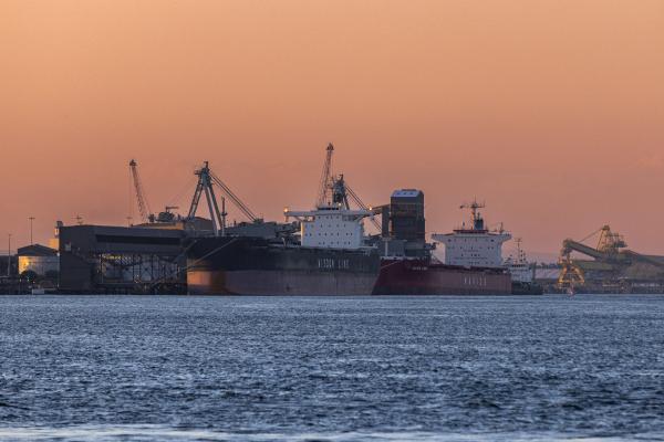 A number of ships at sunset at the Port of Newcastle