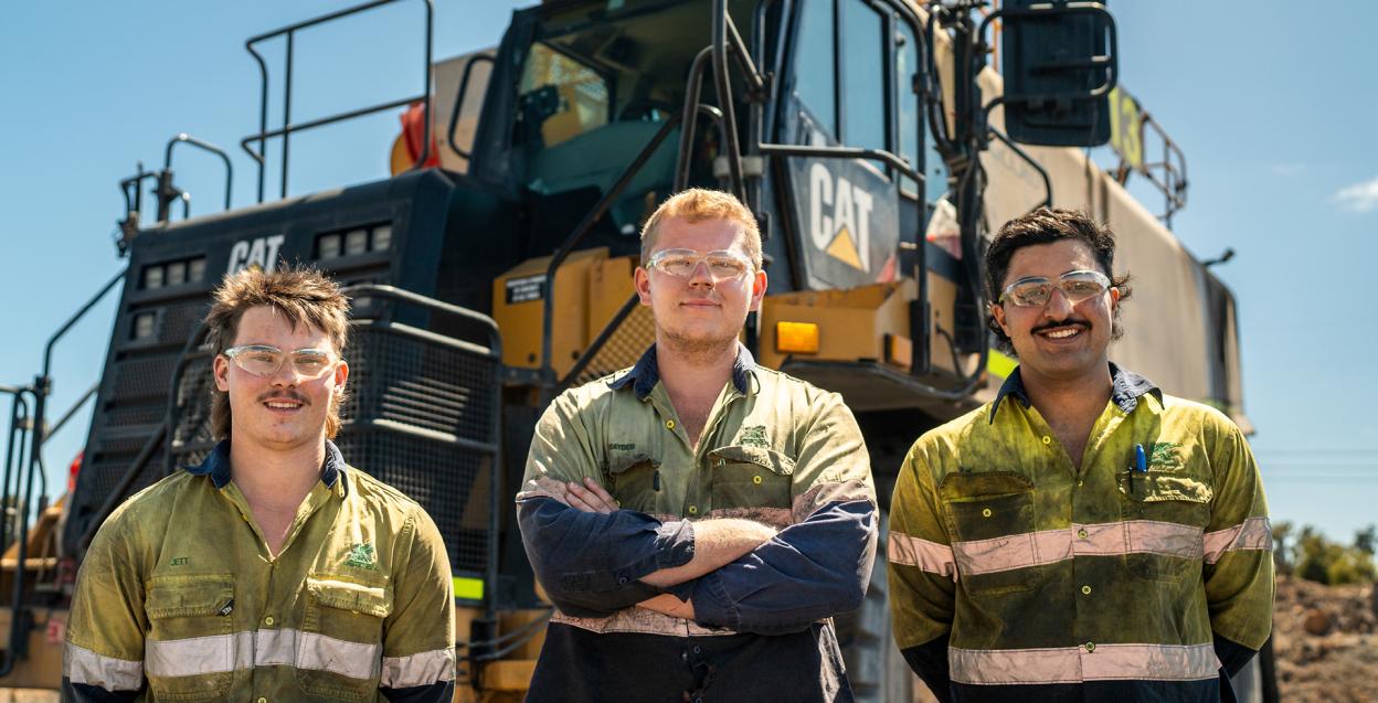 Griffin Coal, three mechanics in front of truck